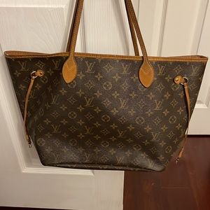 Louis Vuitton signature neverfull mm. Authentic. Used